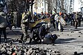 A police officer attacked by protesters during clashes in Ukraine, Kyiv. Events of February 18, 2014