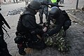 Detention of a protester by interior troops officers. Clashes in Kyiv, Ukraine. Events of February 18, 2014