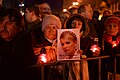 Elderly woman holding Yulia Tymoshenkoportrait as a sign of support. Kyiv, Ukraine. Events of February 22, 2014.-2