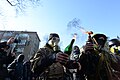Masked and hooded protesters holding Molotov Cocktails seen during clashes in Ukraine, Kyiv. Events of February 18, 2014
