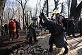 Protesters dismantling brickstone pavement to use it as a mean of self-defence. Clashes in Ukraine, Kyiv. Events of February 19, 2014.-1