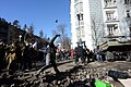 Protesters throwing brickstone in direction of the barricade line. Clashes in Kyiv, Ukraine. Events of February 18, 2014