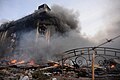 Trade union building facing Maidan square is burning into flames. Clashes in Ukraine, Kyiv. Events of February 20, 2014