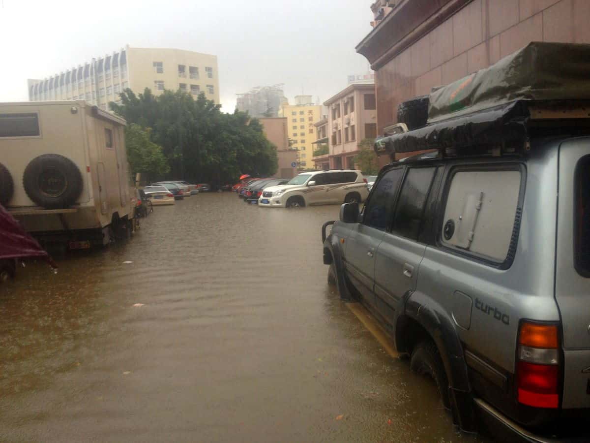 Driving through floodwater in Kunming, China