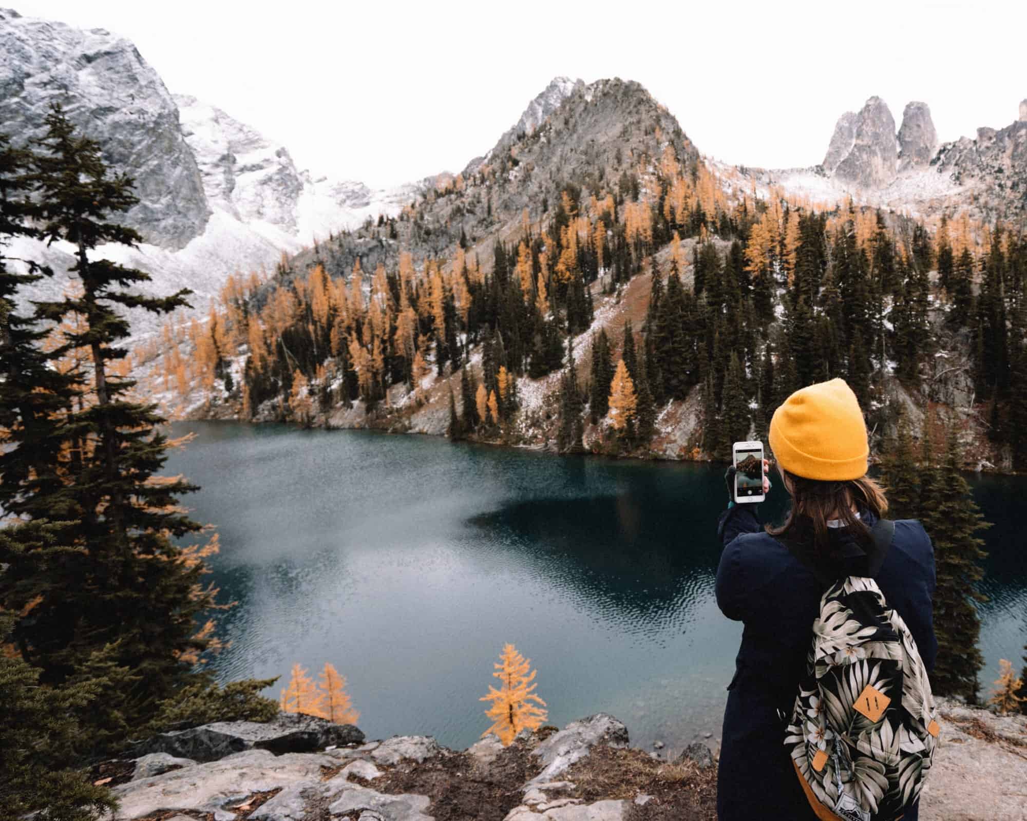 Female hiker on phone