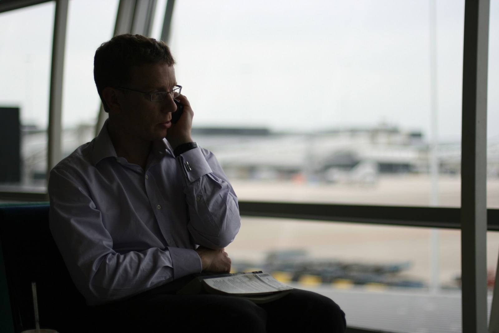 Man on phone in airport