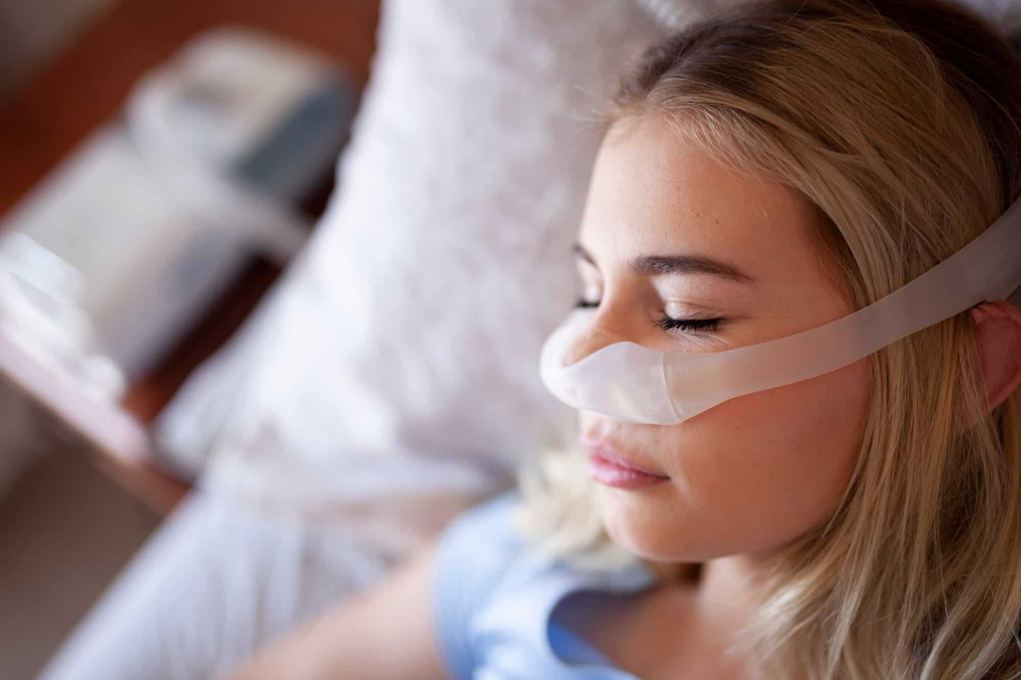 Woman with CPAP machine